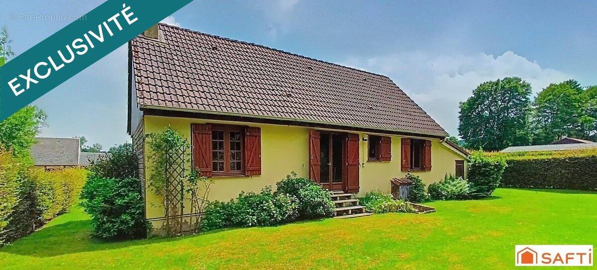 Photo 1 - Maison à LA MADELEINE-BOUVET