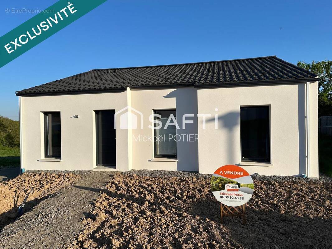 Photo 1 - Maison à MOUTIERS-LES-MAUXFAITS