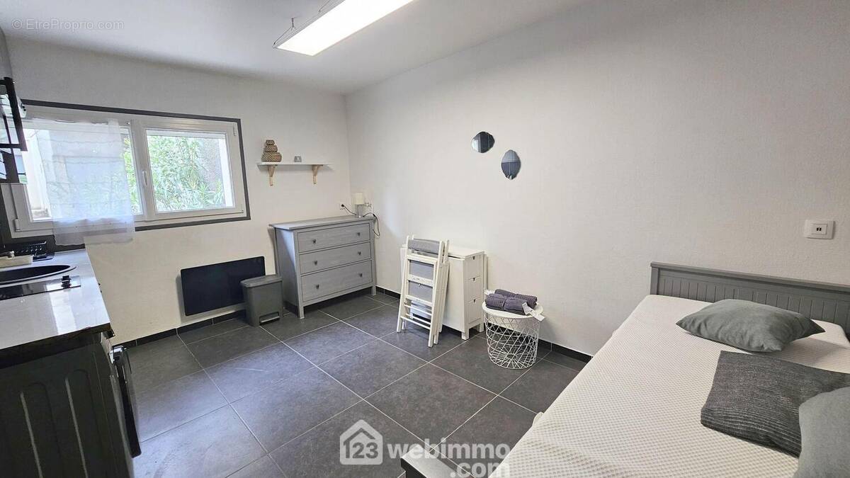 Le séjour de 14 m². - Appartement à BALLANCOURT-SUR-ESSONNE