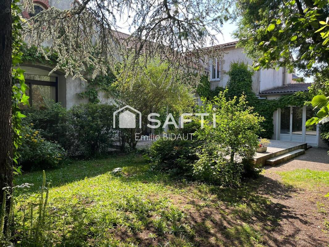 Photo 1 - Maison à LES BROUZILS