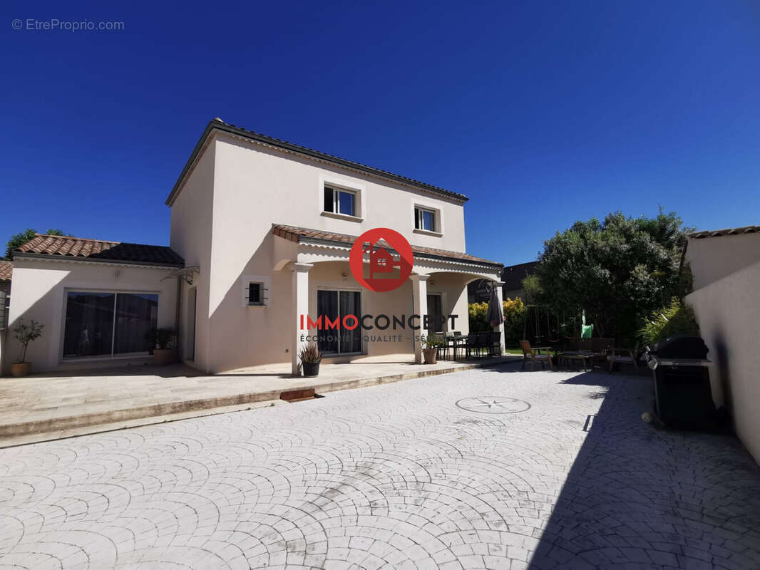 Maison à LAUDUN-L&#039;ARDOISE