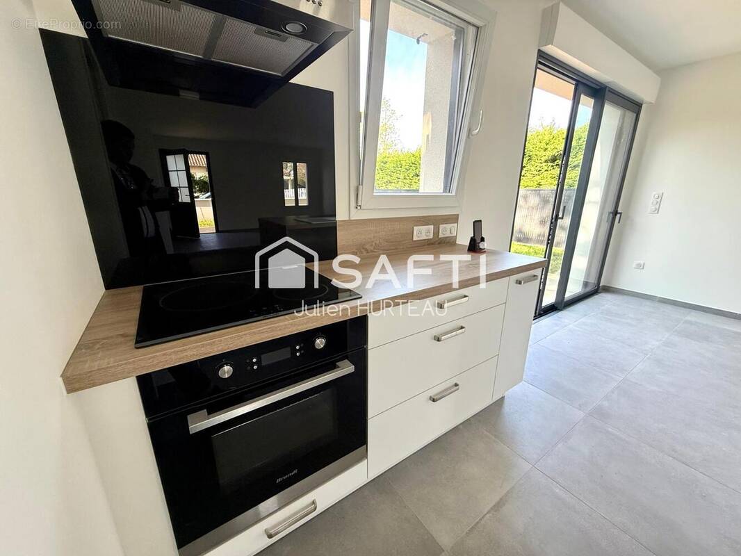 Photo 1 - Maison à VOUILLE