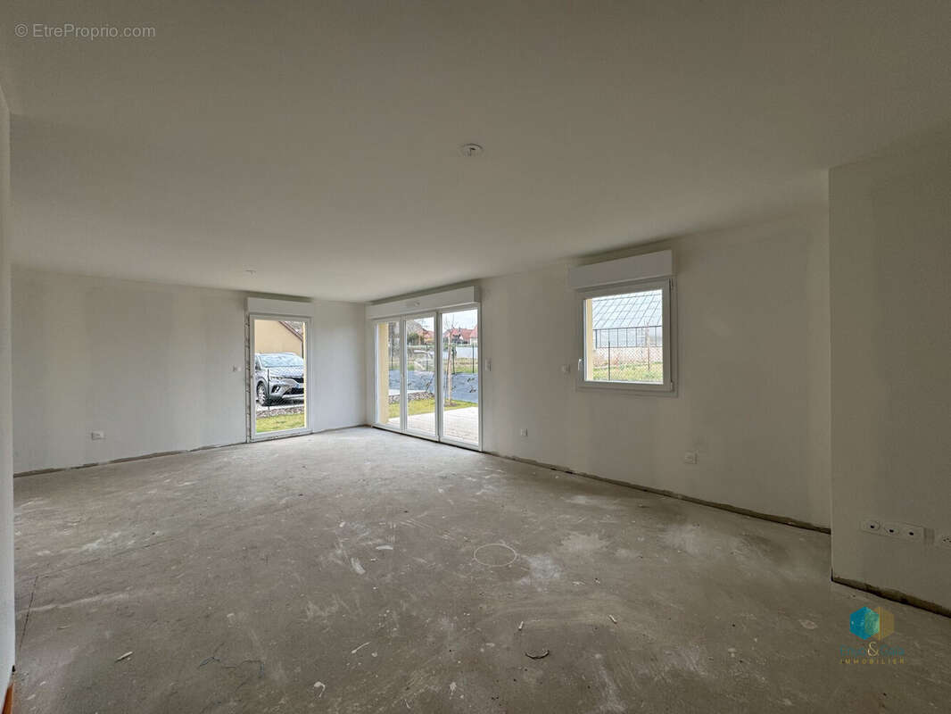 Pièce de vie - Appartement à EPFIG