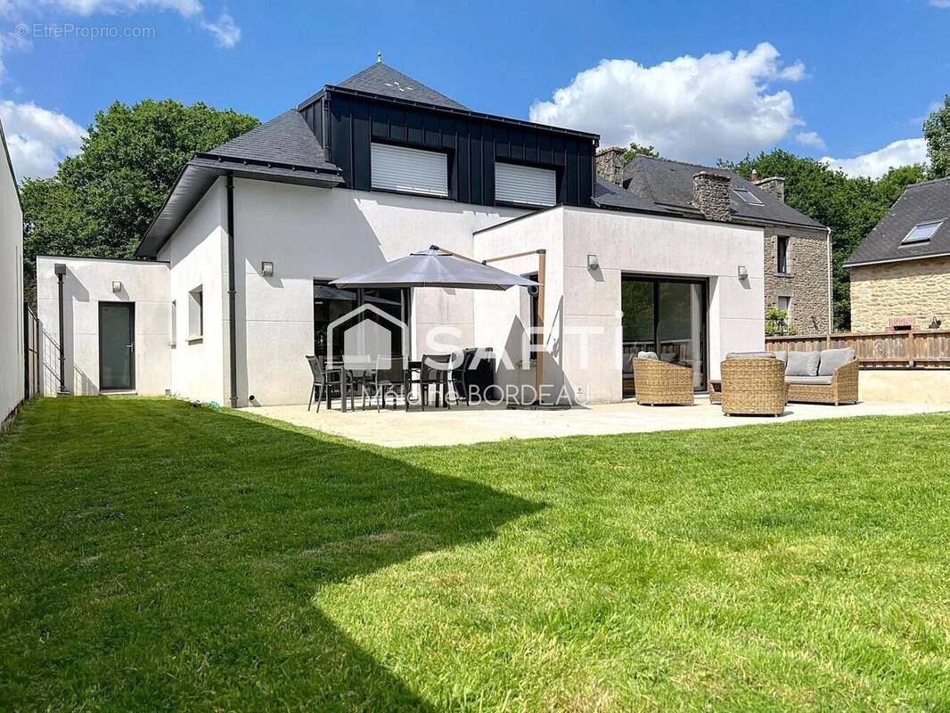 Photo 1 - Maison à LOCMARIA-GRAND-CHAMP