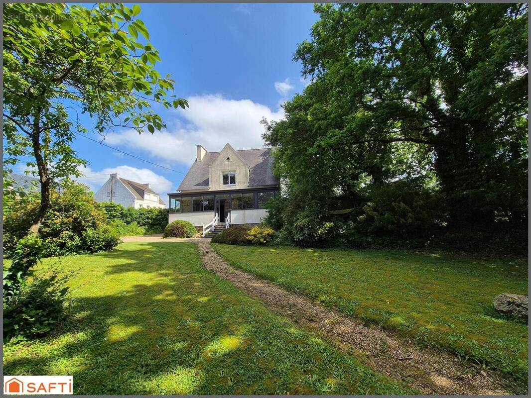 Photo 1 - Maison à LANDIVISIAU