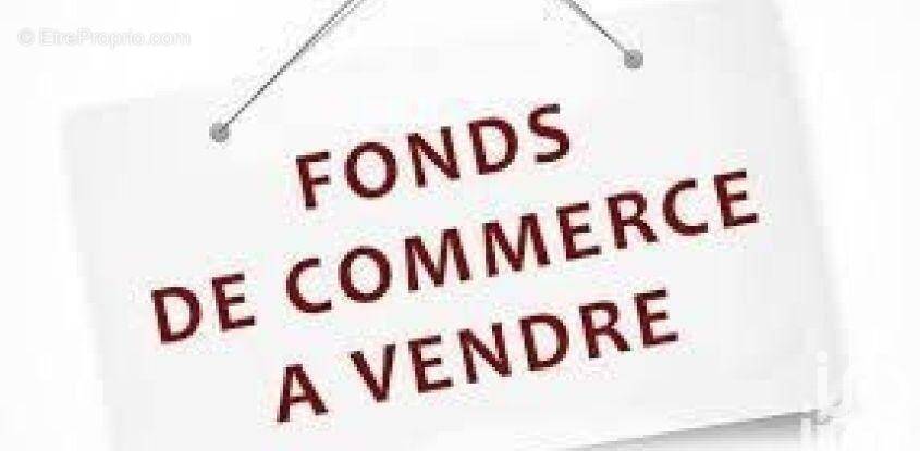 Photo 1 - Commerce à LES ULIS