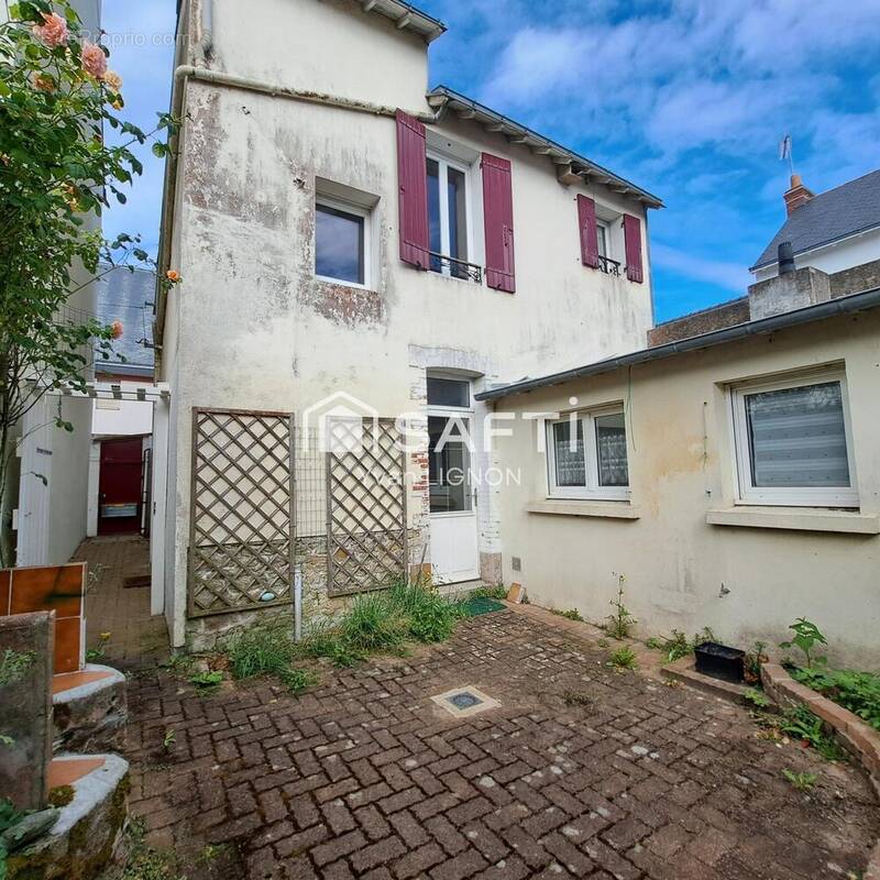 Photo 1 - Maison à LE POULIGUEN