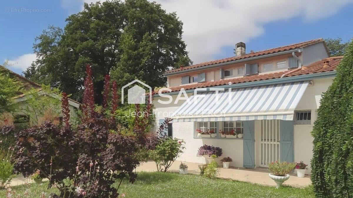 Photo 1 - Maison à LE HAILLAN