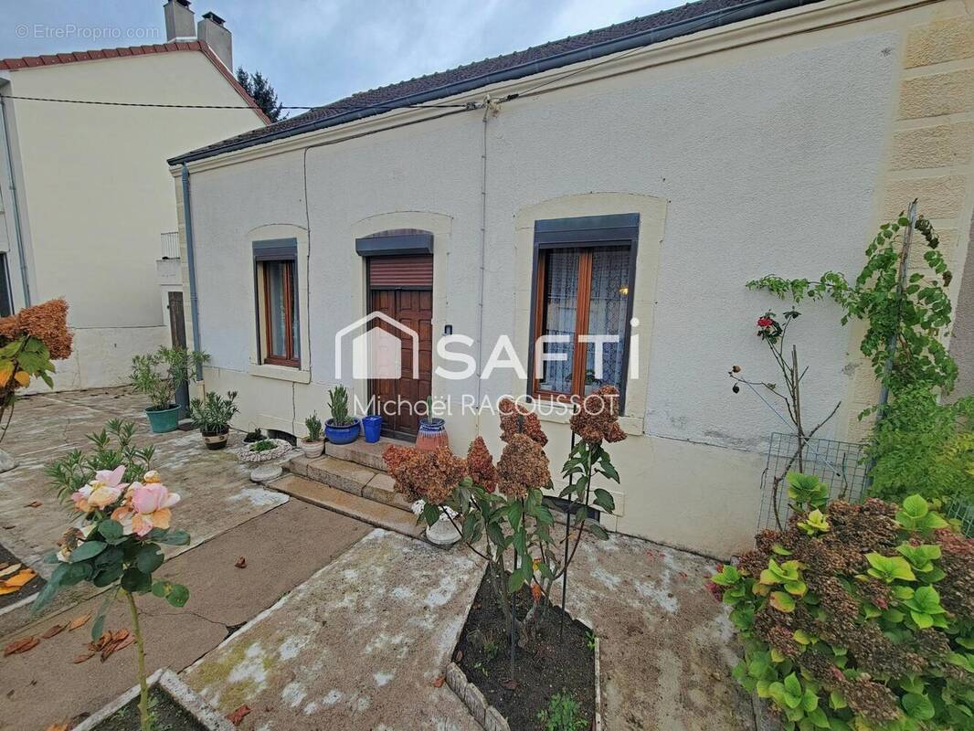 Photo 1 - Maison à LE CREUSOT